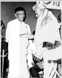 Azeez honoured by draping the Golden Shawl after presiding at the      Tamil Nadu Muslim Educational Conference in Chennai, South India in      September 1973