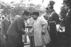 Azeez greeting H.E. Khwaja Nazaimuddin, Govenor-General of Pakistan