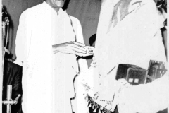 Azeez honoured by draping the Golden Shawl after presiding at the      Tamil Nadu Muslim Educational Conference in Chennai, South India in      September 1973