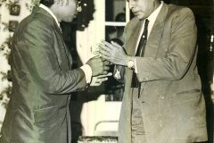 Azeez greeting Prof. Rezvi Sheriff at his wedding on 4.11.1973