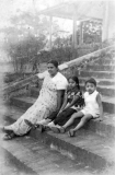 Ummu, Marina and Ali on the steps at 'Mount Airy' in Kandy in 1944