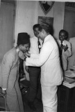 Azeez Chaining the New President S.H.A Wadood in 1958