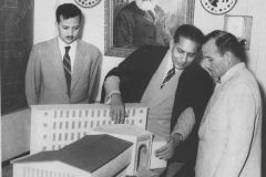 H.E. Ahmad Foad Naguib, Ambassador for Egypt inspecting model of the Ceylon Muslim Cultural Center at Zahira College in 1959