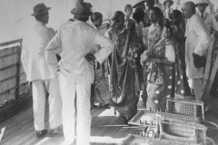 M.I. Mohamed Alie J.P. (at right) on board at Colombo Passenger Jetty on his departure to Mecca on pilgrimage in 1925. On his return he died and was buried at sea