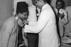 Azeez Chaining the New President S.H.A Wadood in 1958